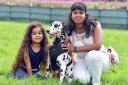 Linda Khan and Courtney Khan aged seven with Penny at Bleakholt Animal Sanctuary dog show