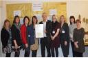 Staff from Lancashire & South Cumbria NHS Foundation Trust, which runs the Health Visiting Services in Blackburn with Darwen, with the UNICEF and World Health Organisation Gold Standard Baby Friendly Award