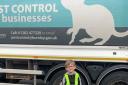 Samuel Sanderson with his dad warching the bin lorries