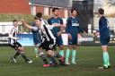 Chorley's Connor Hall (second left) celebrates scoring his side's first goal of the game during the Emirates FA Cup third round match at Victory Park, Chorley.