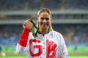 Sophie Hitchon, with the bronze medal she won at the Rio Olympics, has announced her retirement