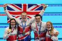 Great Britain's Kathleen Dawson, Adam Peaty, James Guy, and Anna Hopkin with their Gold medals for the Mixed 4 x 100m medley relay at Tokyo Aquatics Centre on the eighth day of the Tokyo 2020 Olympic Games in Japan.