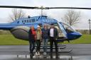 Dave Fishwick took Laura Nutall for a ride in his helicopter, helping to tick off another item on her bucket list. Pictured here with mum, Nicola and sister Gracie.