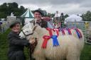 Brogan Barker and dad, Chris, with the winning ewe and lamb and the Hodder Valley Show in 2018. Picture: Rachael Dudziak