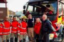 Laura Nuttall and her parents with Aaron Lee and other firefighters at Oldham Fire Station