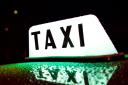 Stock image of taxi sign