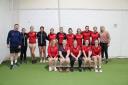West Lancs Cricket Development Group's squad with Lancashire Thunder players Ellie Threlkeld and Danielle Collins
