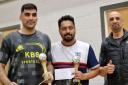 Doubles winners Azam Ali Sharif and Albitto Joy with organiser Mohammed Kabir Sharif