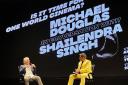 Hollywood actor and producer Michael Douglas speaks to Indian film producer Shailendra Singh at a session on the last day of the 54th International Film Festival of India in Goa (Vineeta Deepak/AP)