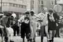 Fancy-dress pancake racers in Blackburn town centre, 1987