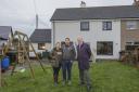 Stuart Hirst, chairman of Ribble Valley Borough Council's health and housing committee, with Ben and Beth Powney, who re-rendered their rural home and installed a new boiler, windows and doors, with the help of a first-time buyer grant.