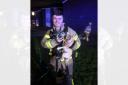 Firefighter Archer gave oxygen to the rescued dog