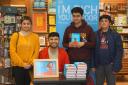 Blackburn’s Shabaz Ali posed with fans at a book signing in the Mall