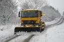 Gritter travelling in snow