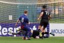 Danny Taylor scores Crown Paints third goal against Eleven Sports Media in the LFA Sunday Trophy final