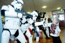 HEROES AND VILLAINS Cody Love with stormtroopers