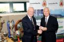 WELL DONE Steve Lee receives long service award from Lancashire FA president Gordon Howard