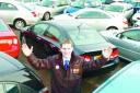 DRIVING FORWARD: Motorpoint local manager Jon Grace celebrates the announcement that it is to double the size of its Burnley site at Rosegrove