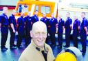 ENDING ON A HIGH: Colin Western’s colleagues line up to honour him after he rescued a woman from a house in Petre Crescent, Rishton