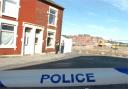 SCENE: Police tape on the street in Little Harwood, Blackburn
