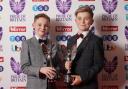 Hughie Higginson and Freddie Xavi with their Pride of Britain trophies