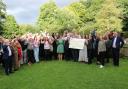 Representatives of six charities together with staff from Joseph Holt at recent presentation evening at The Woodthorpe pub in Prestwich.