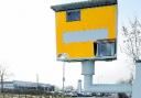 NOT IMPRESSED: David Birtwistle with the speed camera on the A59 Longsight Road in Osbaldeston