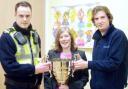 CUP TIE PCSO: John Pepper, head teacher Averil Culverhouse and  council officer Aled Thomas