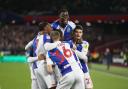 The Rovers players celebrate the opening goal in the win at West Ham United