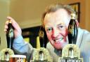 NEW ALE Managing director David Grant with a pint of Moorhouse’s new beer Royal Appointment