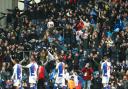 Rovers fans celebrate after the final whistle