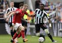 Nottingham Forest's Lewis O'Brien and Newcastle United's Allan Saint-Maximin battle for the ball