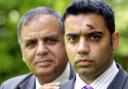 CALM Shahid Malik with his father Rafique, the Deputy Mayor of Burnley, shows his injuries at his home in Burnley