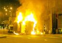 FLASHBACK A torched car during the 2001 disturbances