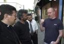 TALKS A multi-faith group on the streets discussing the aftermath of the Burnley riots in 2001