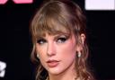 Taylor Swift, who could make history at the 2024 Grammy Awards as the first person to win album of the year four times.