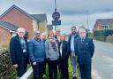 Councillors and residents in Guide stand with the new speed sign in the village