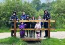 Children and staff from Crawshawbooth Primary School after planting plants at the park