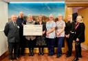 Cheque presented to Pendleside Hospice on behalf of Eric Wright Charitable Trust