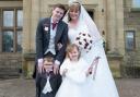 Rebecca Oldham on her wedding day with husband Steven and children Jack and Emily