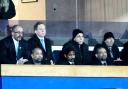 IN ATTENDANCE Balaji Rao, now shorn of his ponytail, and Venkatesh Rao in the front row at Tuesday’s game