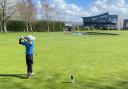 Seven-year-old Freddie Kellow teeing off