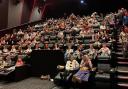 The packed cinema auditorium during the screening