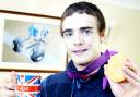 Proud Steven Burke with his gold medal