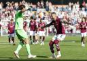 Burnley&rsquo;s Kyle Walker and keeper Max Weiss celebrate following victory in the penalty shootout at Turf Moor