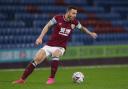 Phil Bardsley in action for the Clarets