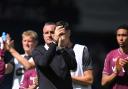 Burnley manager Nicky Hayen applauds the travelling Clarets fans after Sunday's defeat at The Hawthorns
