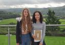 From left, Lexie Traynor and Adela Bumbac are very happy following their GCSE results with Lexie achieving the new 9 Grade in English and Adela a 9 in maths at Bowland High School