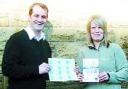 CREDIT CRUNCH: Jake Berry and shopper Hannah Gee with the Tories cards