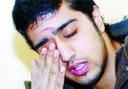 HEARTBROKEN: Umar Shafiq in tears following the death of  his father Mohammed Shafiq,